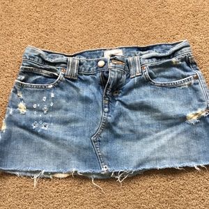 Distressed jean mini skirt